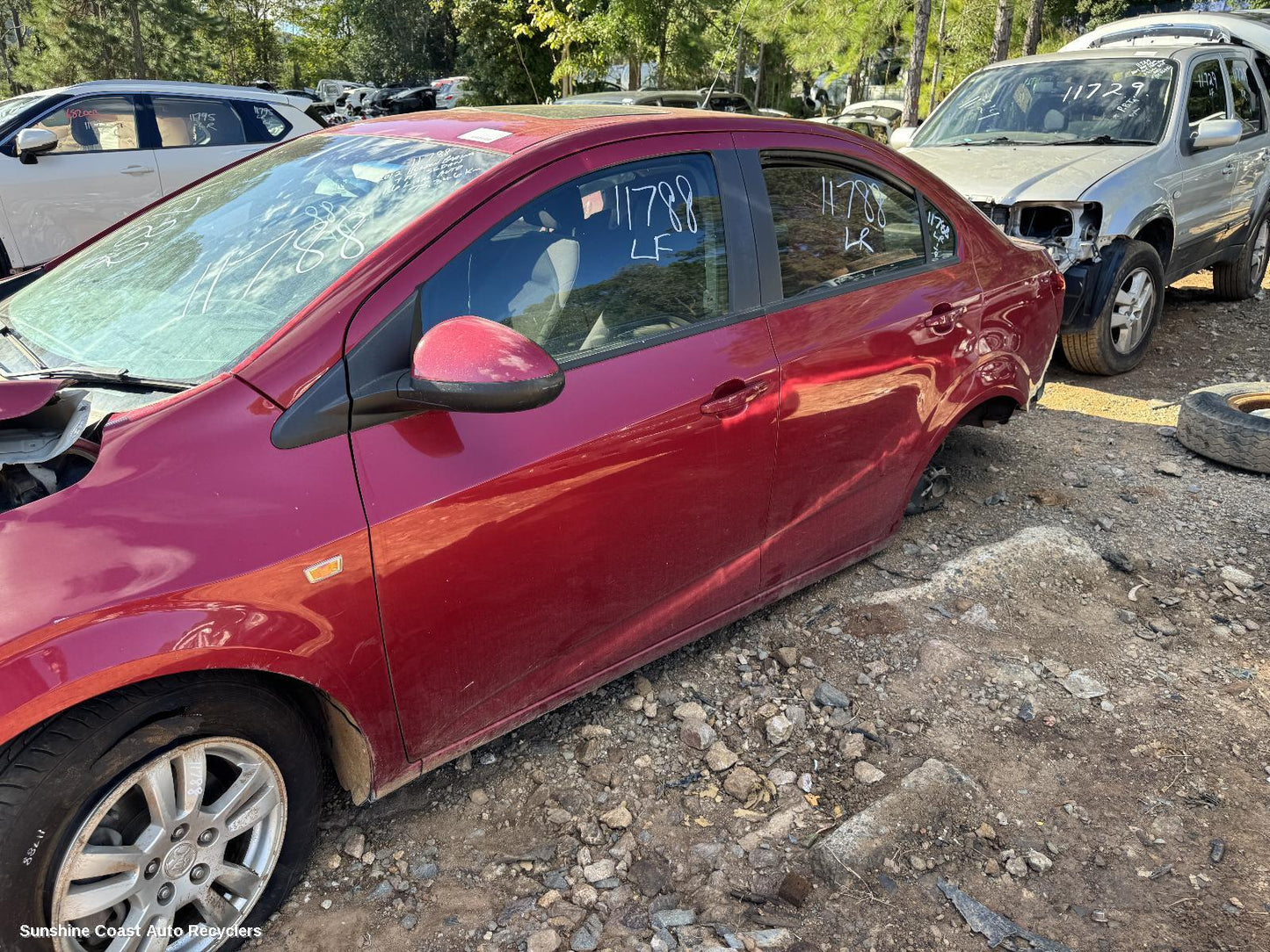 2012 Holden Barina Overflow Bottle