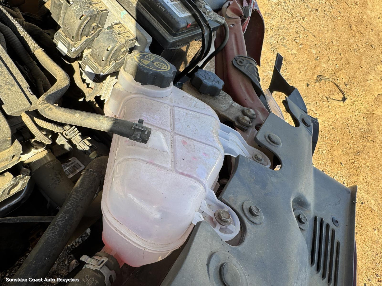 2012 Holden Barina Overflow Bottle