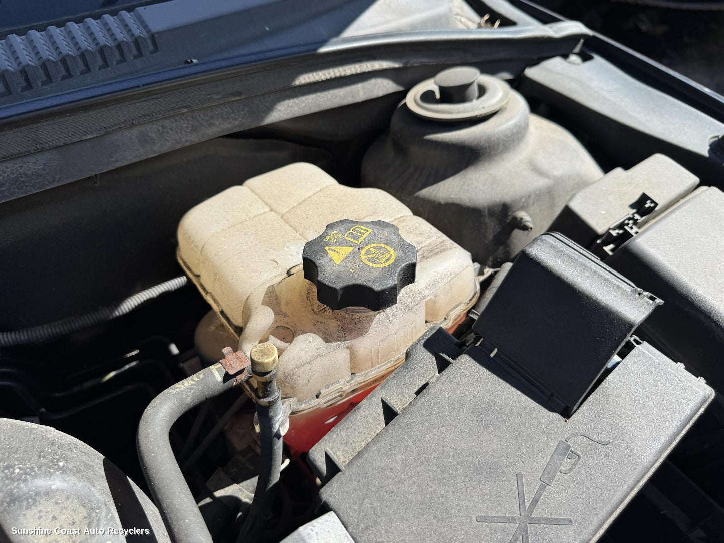 2010 Holden Cruze Overflow Bottle