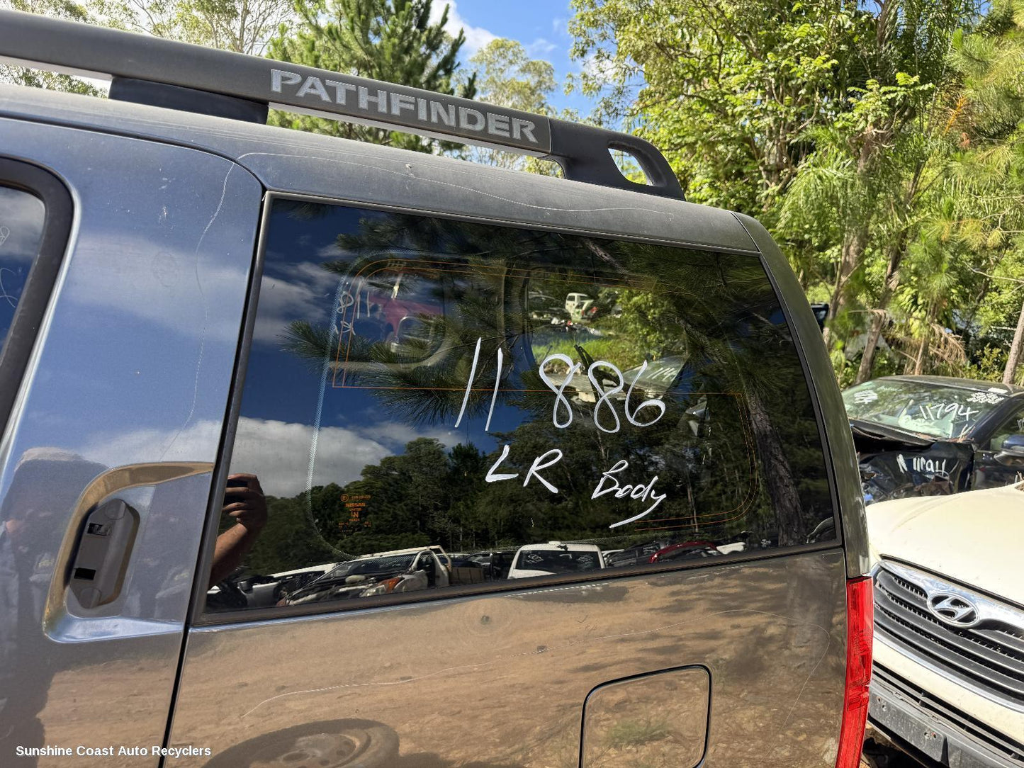 2012 Nissan Pathfinder Left Rear Side Glass